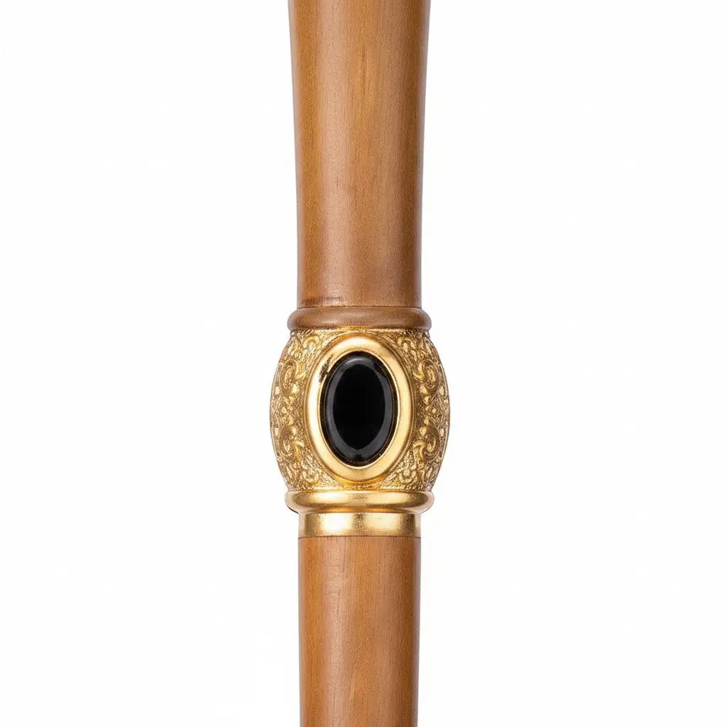 La boutique Aux 2 Balais : baguette en résine de Mondingus Fletcher, réplique Warner Bros. avec bague dorée et pierre noire.