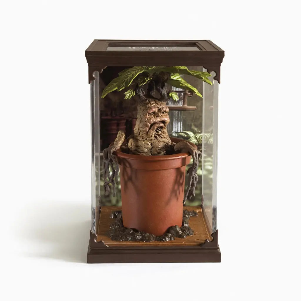 Detail pot de terre integre figurine Mandragore mi-plante mi-bebe Harry Potter Noble Collection PVC