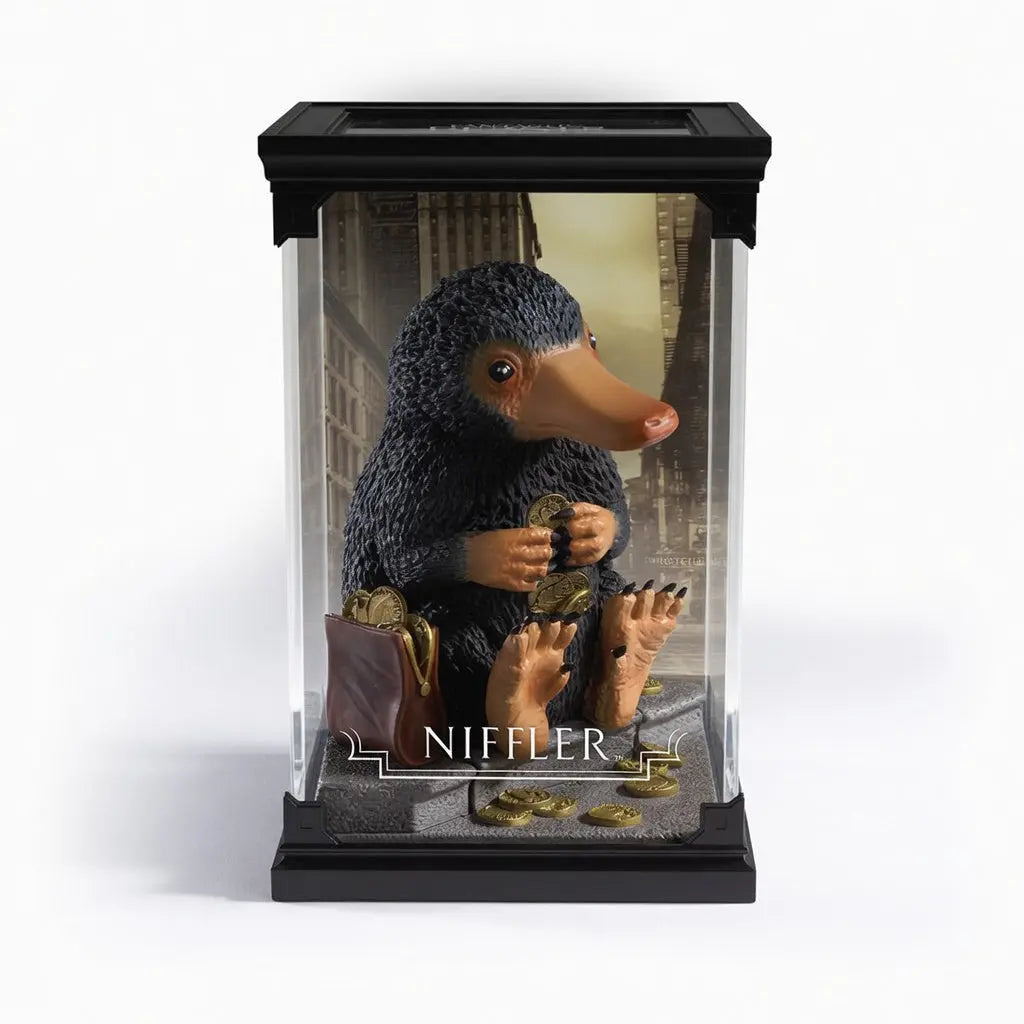 Figurine Niffleur Animaux Fantastiques Noble Collection PVC peint a la main 17cm pose debout