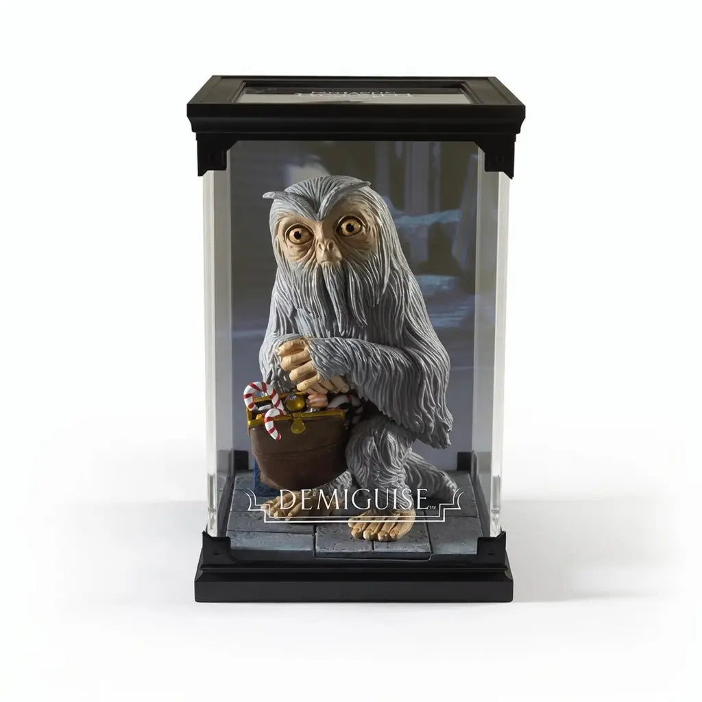 Figurine Demiguise Animaux Fantastiques Noble Collection PVC peint a la main fourrure blanche 17cm