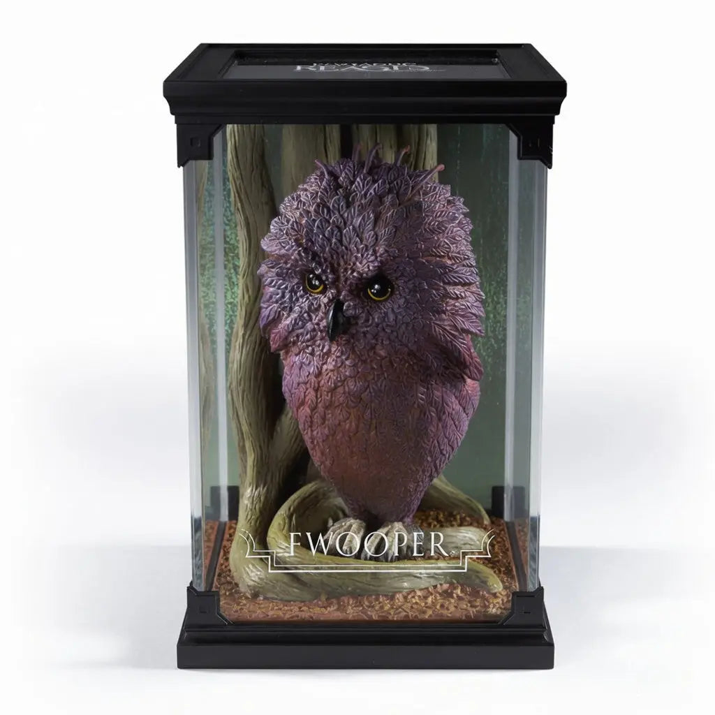 Figurine Focifere Animaux Fantastiques Noble Collection PVC peint a la main plumage vert-dore 17cm