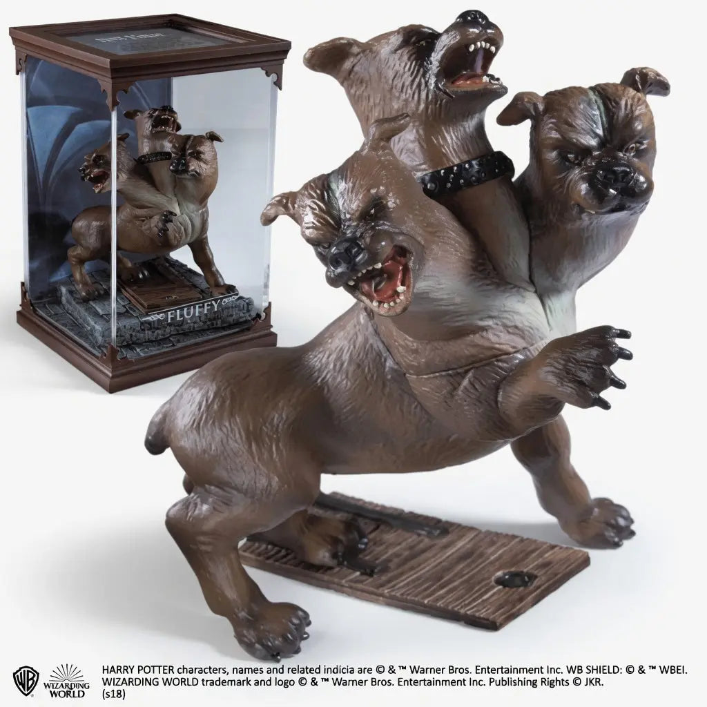 Detail trois tetes expressions distinctes figurine Touffu chien Harry Potter Noble Collection PVC