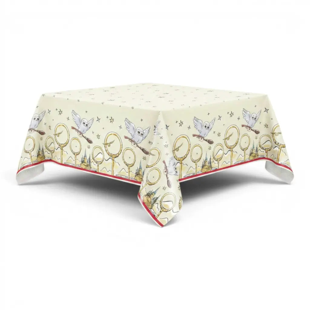 La boutique Aux 2 Balais Nappe papier Harry Potter Quidditch Hedwige 137x213cm, motifs étoiles et hiboux sur fond clair.