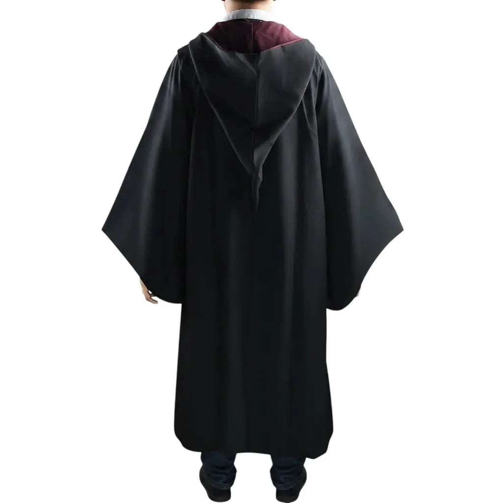 La boutique Aux 2 Balais Robe de sorcier enfant noire polyester avec doublure bordeaux et écusson Gryffondor