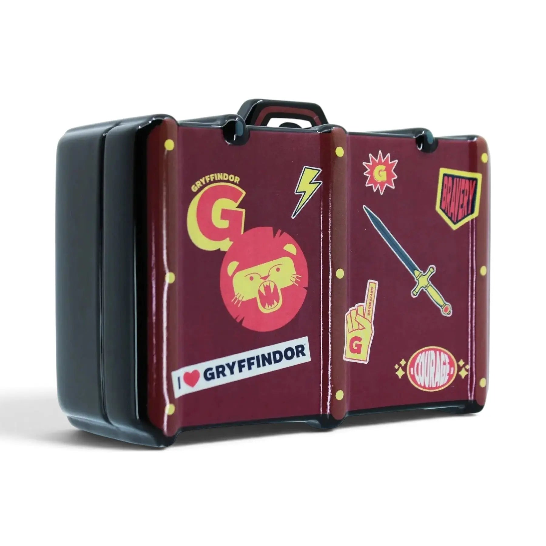 Tirelire valise en céramique La boutique Aux 2 Balais aux couleurs de Gryffondor avec des autocollants décoratifs